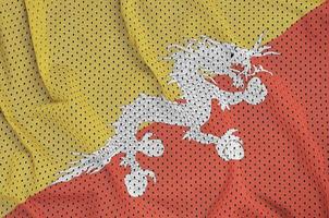 Bhutan-Flagge gedruckt auf einem Polyester-Nylon-Sportbekleidungs-Mesh-Gewebe foto