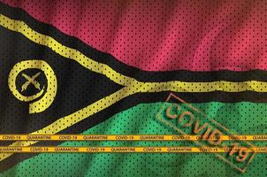 vanuatu-flagge und orangefarbener covid-19-stempel mit randband. Coronavirus- oder 2019-ncov-Viruskonzept foto