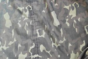 Camouflage-Hintergrundtextur als Hintergrund für Militärdienst-Designprojekte foto