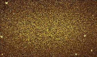 goldglitter, goldpartikelstern auf schwarzem hintergrund. foto