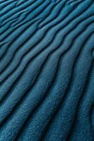 Textil mit blauen und schwarzen Streifen foto