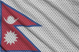 Nepal-Flagge gedruckt auf einem Polyester-Nylon-Sportswear-Mesh-Gewebe m foto