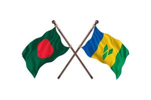 bangladesch gegen saint vincent und zwei länderflaggen der grenadinen foto