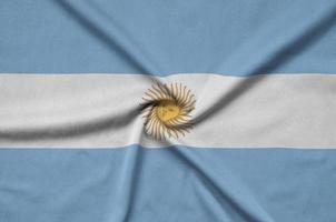 Die argentinische Flagge ist auf einem Sportstoff mit vielen Falten abgebildet. Sportteam-Banner foto