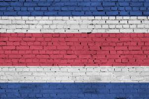 Costa-Rica-Flagge ist auf eine alte Mauer gemalt foto