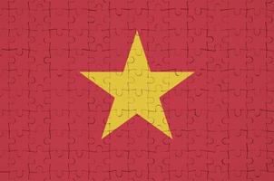 Vietnam-Flagge ist auf einem Faltpuzzle abgebildet foto