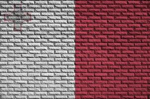 Malta-Flagge ist auf eine alte Mauer gemalt foto