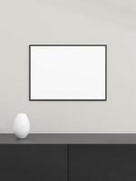 fotorahmenmodell auf schwarzem tisch. Plakatmodell. sauberer, moderner, minimaler Rahmen. minimalistischer Hintergrund. leeres bilderrahmenmodell. 3D-Rendering. foto