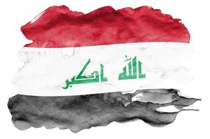 die irak-flagge ist in flüssiger aquarellart dargestellt, die auf weißem hintergrund isoliert ist foto