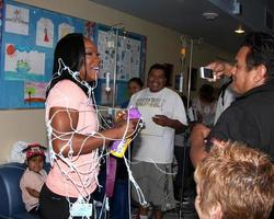 Los Angeles, 16. September - Carmelita Jeter at the Stars 4 Smiles, Promis besuchen Kinder im Krankenhaus des Harbor-Ucla Medical Center am 16. September 2014 in Torrance, ca foto