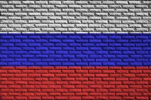 Russland-Flagge ist auf eine alte Mauer gemalt foto