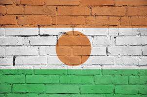 Niger-Flagge ist auf eine alte Mauer gemalt foto