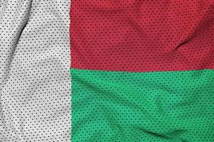 Madagaskar-Flagge gedruckt auf einem Polyester-Nylon-Sportswear-Mesh-Gewebe foto