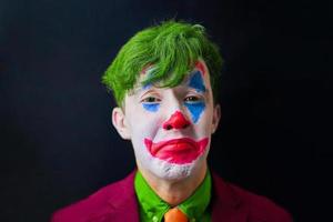Mann in Clown Make-up foto