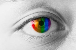 farben augen vision konzept, lgbt regenbogen bunte schüler nahaufnahme makro foto