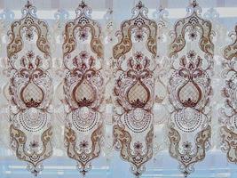 abstraktes symmetrisches Muster auf dem Vorhang. foto