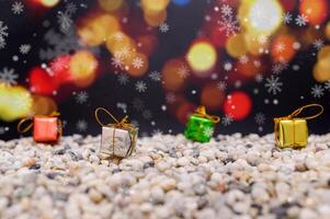 Frohe Weihnachten Hintergrund mit Miniatur Geschenkboxen foto