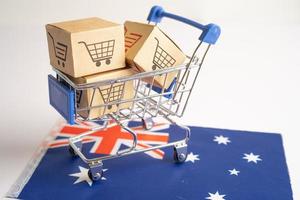 Box mit Einkaufswagen-Logo und Australien-Flagge, Import-Export-Shopping online oder E-Commerce-Finanzierungslieferservice-Shop-Produktversand, Handel, Lieferantenkonzept. foto