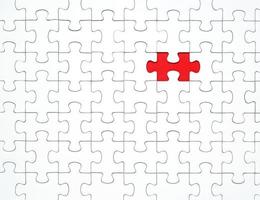 weiße Puzzleteile auf rotem Grund getrennt foto