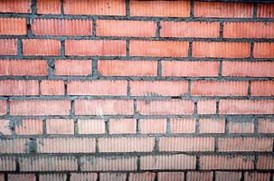 Fotohintergrund Backsteinmauer des Hauses im Dorf foto