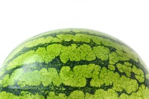 Wassermelone mit gestreifter Schale auf einem weißen, isolierten Hintergrund. Vielzahl von Wassermelonen gelb foto