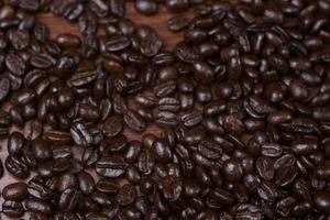 Kaffeebohnen Holz Hintergrund foto