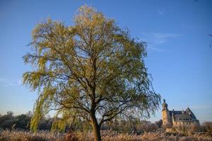 Herbst auf einem Schloss in Westfalen foto