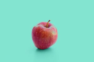 schöner roter Apfel auf einem nahtlosen Superfood-Hintergrund foto