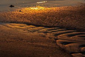 Muster im Strandsand foto