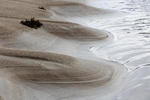 Muster im Strandsand foto