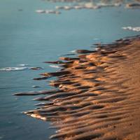 Muster im Strandsand foto