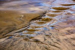 Muster im Strandsand foto