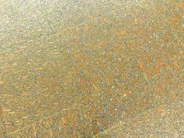 Textur, orange Fliesen auf dem Boden. Fliesen aus Keramik, Betonmaterialien. auf einer Fliese farbige Steine in rechteckiger Form. Hintergrund, natürliche Textur foto