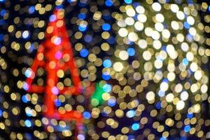 verschwommene Weihnachtsbeleuchtung Gold Bokeh. foto