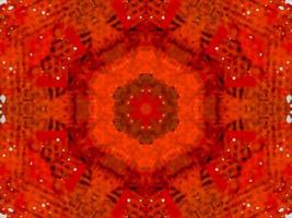 buntes rotes Feuer Kaleidoskop Hintergrund abstrakte Blume und symmetrisches Muster foto