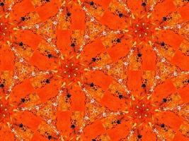 buntes rotes Feuer Kaleidoskop Hintergrund abstrakte Blume und symmetrisches Muster foto