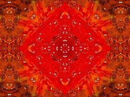 buntes rotes Feuer Kaleidoskop Hintergrund abstrakte Blume und symmetrisches Muster foto