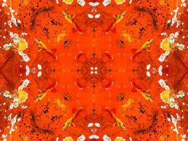 buntes rotes Feuer Kaleidoskop Hintergrund abstrakte Blume und symmetrisches Muster foto