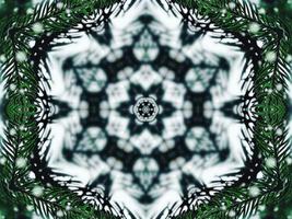 verschwommene grüne Blätter Kaleidoskophintergrund abstrakte Blume und symmetrisches Muster für Weihnachtsstimmung foto