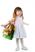 kleines Mädchen einkaufen foto