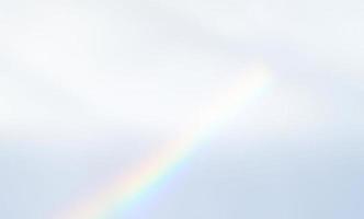 Zusammenfassung der verschwommenen Regenbogenprisma-Lichtüberlagerung auf grauem Hintergrund für Mockup und dekorativ auf dem Produkt foto