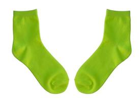grüne Socken isoliert auf weißem Hintergrund foto