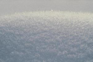 Nahaufnahme Schneehaufen mit Schneeflocken Makroaufnahme Konzeptfoto foto