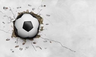 Fußball fliegt mit Rissen durch die Wand foto