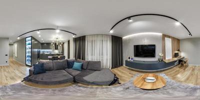 Vollständiges, nahtloses HDRI-360-Panorama im Inneren der Gästewohnzimmerhalle mit Küche im Studio-Apartment mit Tischsofa und Fernseher in äquirechteckiger Kugelprojektion, vr-Inhalt foto