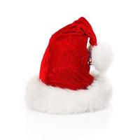 Weihnachtsmütze auf weißem Hintergrund foto