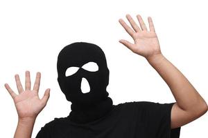 Mann mit schwarzer Maske Einbrecher Dieb Gesicht foto