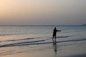 Strandangeln, traditionelles Angeln als Hobby foto