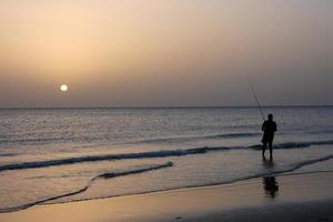 Strandangeln, traditionelles Angeln als Hobby foto