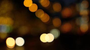 abstrakter bunter hintergrund mit bokeh. verschwommene goldene festliche lichter. festliches Zeitkonzept. Parteikonzept. Platz kopieren. runde Form Bokeh. leuchtend gelb. foto